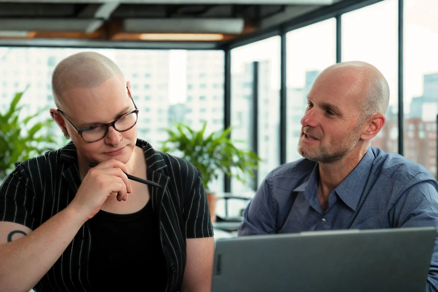 Image for Micah Mitchell and Jared Mitchell dressed in business attire